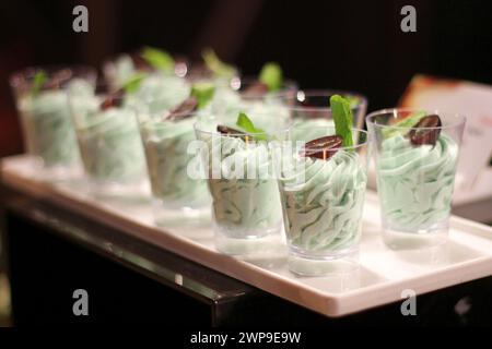 Pistachio Mousse, a velvety delight that marries the rich essence of pistachios with a silky, smooth texture. Stock Photo