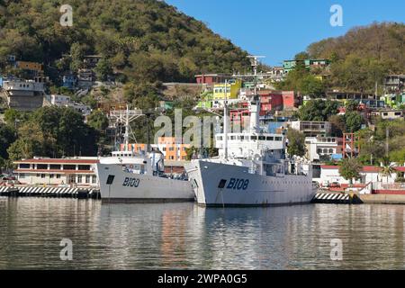 Manzanillo, Mexico - 16 January 2024: ARM Altair B103 and ARM Rio Tecolutla B-108) boats of the Mexican navy moored in the port of Manzanillo. Stock Photo