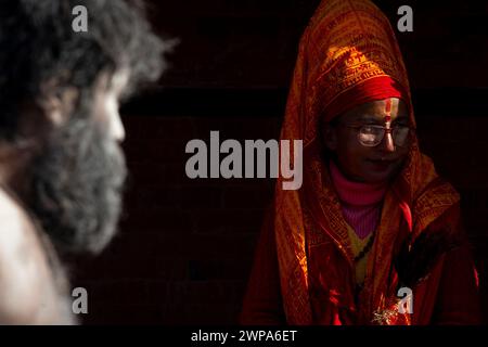 Kathmandu, Nepal. 06th Mar, 2024. On March 6, 2024, in Kathmandu, Nepal. Women devotee in holy attire stay at the premises of the UNESCO World Heritage Site, Pashupatinath Temple ahead of 'Maha Shivaratri' festival. (Photo by Abhishek Maharjan/Sipa USA) Credit: Sipa USA/Alamy Live News Stock Photo