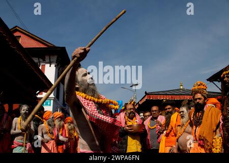 Kathmandu, Nepal. 06th Mar, 2024. On March 6, 2024, in Kathmandu, Nepal. Sadhu, a devotee of Lord Shiva, chants religious hyrms and dance while taking part in a rally procession ahead of the 'Maha Shivaratri' festival at the premises of the UNESCO World Heritage Site, Pashupatinath Temple. (Photo by Abhishek Maharjan/Sipa USA) Credit: Sipa USA/Alamy Live News Stock Photo