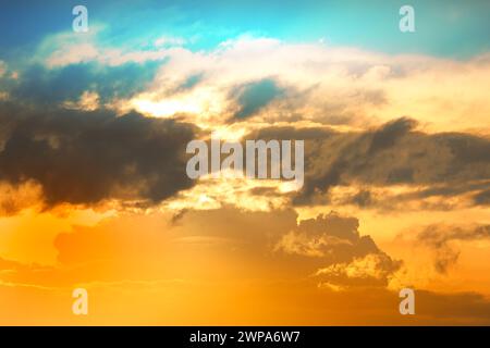 Colorful sky at dawn with cirrus and cumulus clouds Stock Photo