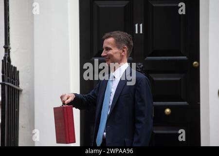 London, United Kingdom. March 06  2024. Chancellor of the Exchequer Jeremy Hunt is seen outside 11 Downing Street before revealing spring budget in the parliament.Credit: Tayfun Salci / Alamy Live News Stock Photo