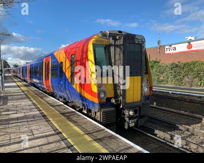 Datchet, Berkshire, UK. 5th March, 2024. A South Western Railway train at Datchet Station in Berkshire. Rail fares have been increased this week by 4.9% causing more financial worries for commuters during the cost of living crisis. Credit: Maureen McLean/Alamy Stock Photo