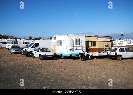 van life old spanish campervans parked up on derelict ground parking area near Playa Honda, Lanzarote, Canary Islands, spain Stock Photo