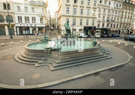 Providentiabrunnen fountain on the Neuer Markt Square. Donnerbrunnen fountain in Vienna's old town - view from above. Empty square in the moring. Stock Photo