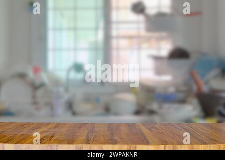 Empty wooden table top for place products and anything on blurred kitchen room background Stock Photo