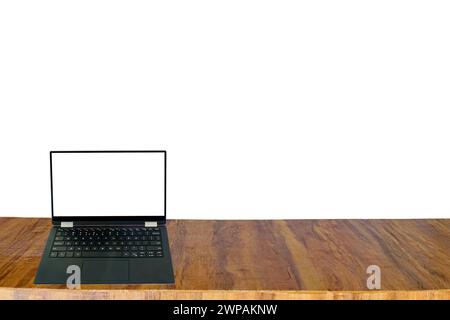 Slim black computer laptop portable open empty white screen display put on wooden table and copy space, isolated on white background Stock Photo