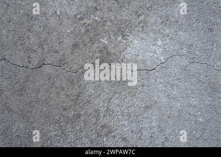 Plastered wall texture. Whitewash surface. Abstract background. Retro wall built structure texture. Cracks and bumps on the concrete wall. Uneven Stock Photo