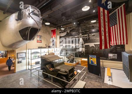 Lansing, Michigan - The Michigan History Museum. The nose of a B-24 Liberator Bomber and a military Jeep are in a display about the Arsenal of Democra Stock Photo