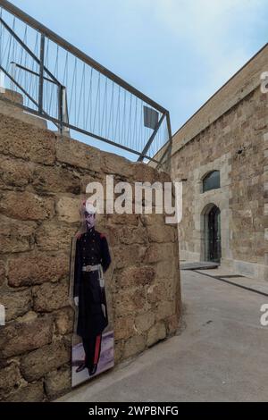 Photo of a soldier on the wall of the Christmas Fort, to the right of the port of the neoclassical city of Cartagena, Region of Murcia, Spain, Europe. Stock Photo