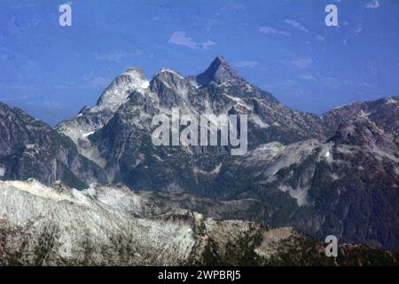 Aerial view of the peaks of Mount Niobe, Mount Pelops, and Omega Mountain, in the Tantalus Range, Coast Mountains, British Columbia, Canada. Stock Photo