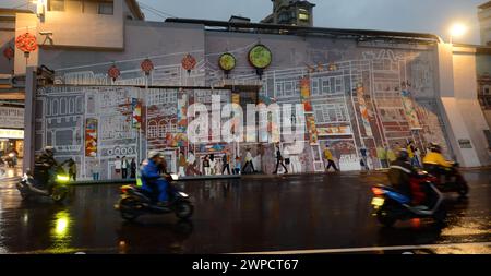 Scooters in a hurry by the Dadaocheng Pier Plaza in Taipei, Taiwan. Stock Photo