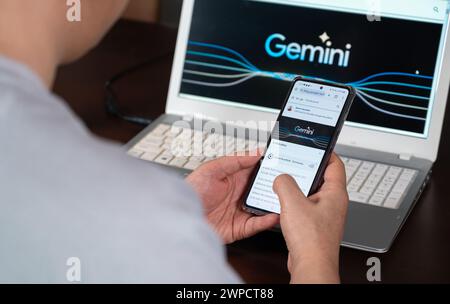 Seoul, South Korea - March 6, 2024 : A man using Google Geminai service. Stock Photo