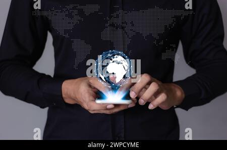 Technology digital marketing, Financial and banking, Businessman using smart phone mobile on blurred background Stock Photo