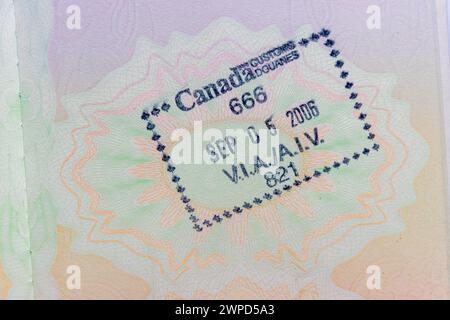 Canada stamp in British passport Stock Photo