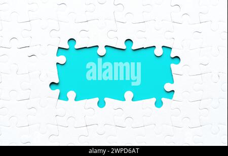 Assembled blank jigsaw puzzle with several missing pieces at the center, forming a frame around the underlying blue background. Unity and progression Stock Photo