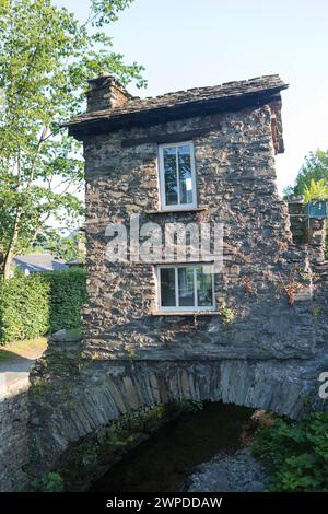 Bridge House tiny stone house on top of a bridge over a stream in