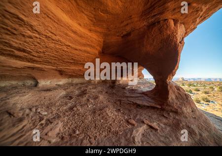 A horizontal landscape framing a bright orange and gold sky opening ...