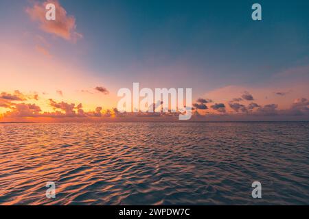 Relaxing waves calm surface seascape horizon. Abstract colorful sunset sky light tranquil relax summer seascape freedom wide angle seascape Stock Photo