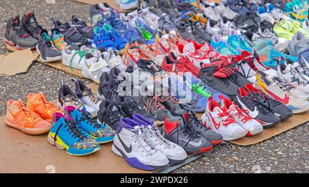 Belgrade, Serbia - February 10, 2024: Second Hand Shoes Sneakers Sports Footwear at Flea Market Bubanj Potok. Stock Photo