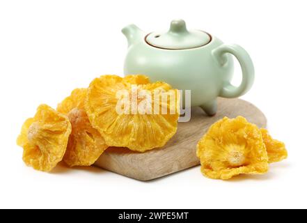 Dried pineapple rings on white background Stock Photo