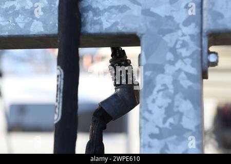 Cycle parking facilities bike lock combination padlock at Farnborough Main railway station with bike racks, Farnborough, Hampshire, UK Stock Photo