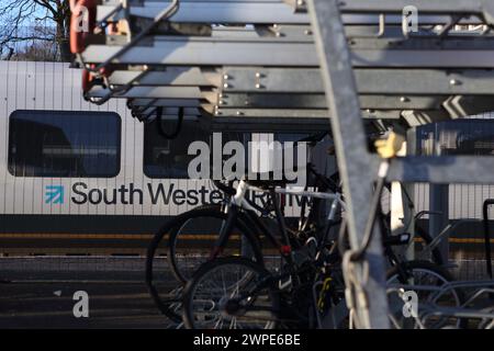 Cycle parking facilities at Farnborough Main railway station with bike racks, Farnborough, Hampshire, UK Stock Photo