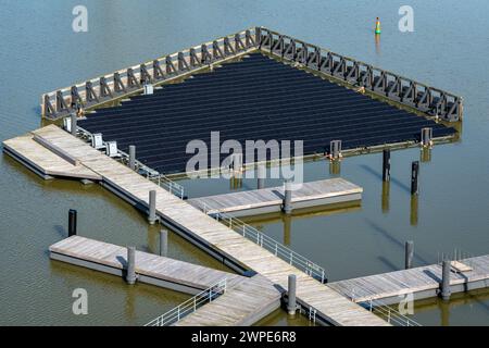 Solar panels on water surface, photovoltaic modules at the harbor Stock Photo