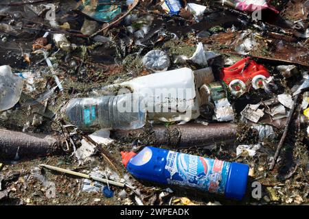 Floating litter including plastic bottles, UK Stock Photo