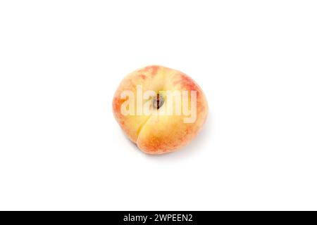 Ripe chinese flat peach fruit or saturn peach with soft shadow isolated on white background with clipping path. Stock Photo