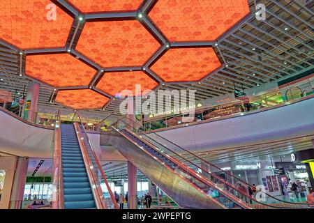 Atrium in the hospitality area of terminal 2 at Manchester Airport, England. Stock Photo