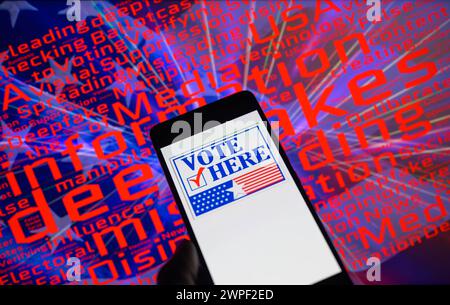 Brussels, Belgium. 05th Mar, 2024. Vote Here icon displayed on a smartphone with a word cloud visible in the background in this photo illustration. Taken in Brussels, Belgium. On March 5, 2024. (Photo by Jonathan Raa/Sipa USA) Credit: Sipa USA/Alamy Live News Stock Photo