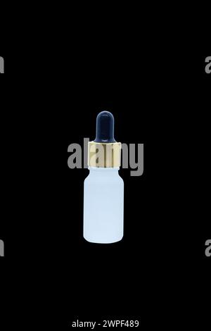 Organic cosmetics mock up, oil bottle for body and face on isolate on Black Background Stock Photo