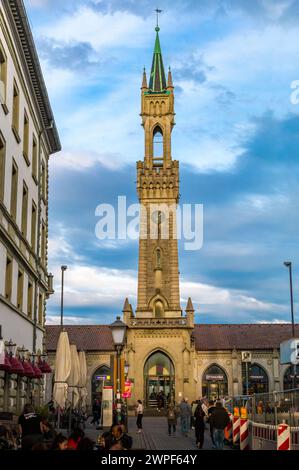 The bell tower of Constance's train station seen from the street Bahnhofstraße in the evening. It was built in 1863 in Gothic and Renaissance styles,... Stock Photo