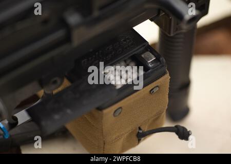 Close up view of a machine gun. Selective focus with shallow depth of field. Stock Photo