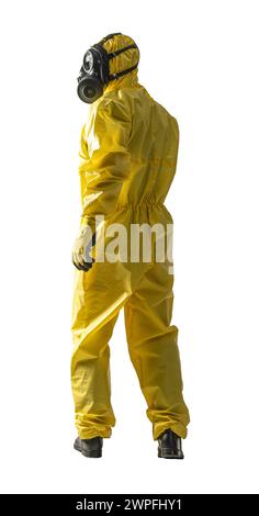 Professional hazmat suit worker standing in full body yellow protective gear with gas mask Stock Photo