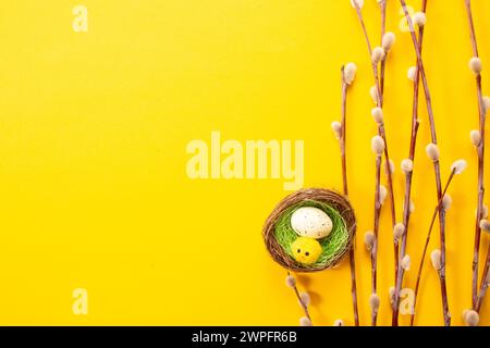 Easter eggs on yellow background. Greetings card, Happy Easters. Flat lay ,top view Stock Photo
