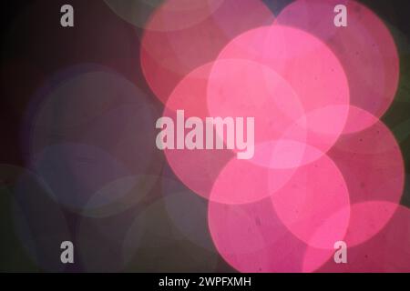 Abstract circular colorful bokeh from the party light on black background Stock Photo