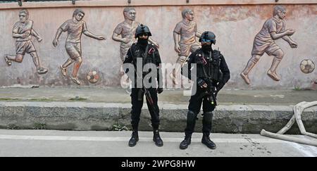 SRINAGAR, INDIA - MARCH 7: National Security Guard (NSG), Commandos maintain vigil during the Prime Minister Narendra Modi's launch of various projects and a public rally at Bakshi Stadium, on March 7, 2024 in Srinagar, India. Thousands of people thronged the Bakshi Stadium to listen to PM Modi's address and even chanted slogans in his support. PM Modi inaugurated a slew of development projects worth ?6,400 crore and addressed the public at the Bakshi Stadium. PM Modi said that he feels elated to be amongst the wonderful people of Srinagar after launching several projects to boost the developm Stock Photo