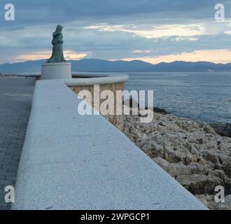 Retaining wall on the coast of the Mediterranean Sea with geometric shapes Stock Photo