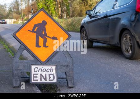 End of roadworks sign in English and Irish, West Cork, Ireland. Stock Photo