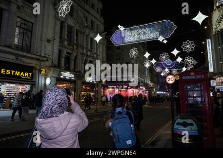 London, UK.  7 March 2024. The Ramadan lights installation on Coventry Street near Piccadilly Circus has been officially switched on by Sadiq Khan, Mayor of London, ahead of the first day of Ramadan 2024 on 11 March.  The lights will remain illuminated for the whole month of Ramadan.  Credit: Stephen Chung / Alamy Live News Stock Photo