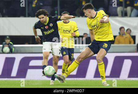 Brussels, Belgium. 07th Mar, 2024. Fenerbahce's Ferdi Kadioglu and Union's Ross Sykes fight for the ball during a soccer game between Belgian club Royale Union Saint Gilloise and Turkish club Fenerbahce, on Thursday 07 March 2024 in Brussels, the first leg of the 1/8 finals of the UEFA Conference League competition. BELGA PHOTO VIRGINIE LEFOUR Credit: Belga News Agency/Alamy Live News Stock Photo