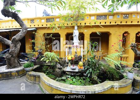 A small garden at a courtyard by the Quan Cong Temple in Hoi An, Vietnam. Stock Photo