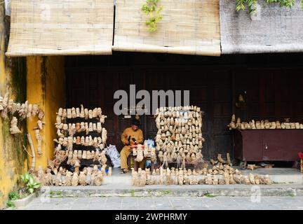 A bamboo artist working on his crafts in the old city of Hoi An, Vietnam. Stock Photo