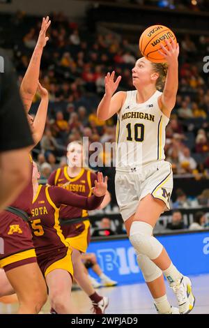 Michigan guard Jordan Hobbs (10) celebrates a basket during the first ...