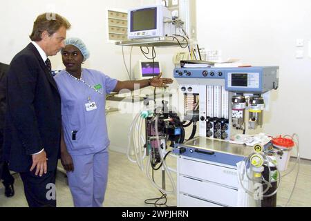 File photo dated 02/09/99 of the then prime minister Tony Blair meeting the then Staff Nurse Rose Amankwaah, now Matron, when he officially opened ACAD - Ambulatory Care and Diagnostic Centre at the Central Middlesex Hospital, Park Royal, London. The former international sprinter, once described as the 'fastest woman in Africa', is retiring after almost five decades as an NHS nurse. Issue date: Saturday March 9, 2024. Stock Photo