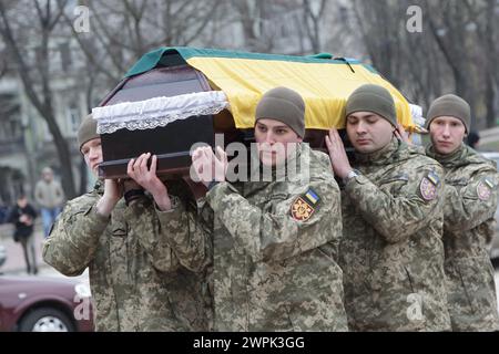 KYIV, UKRAINE - MARCH 7, 2024 - Servicemen carry the coffin with the ...