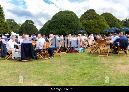 Guests enjoying the hospitality at the Concours of Elegance 2023, Hampton Court Palace, London Stock Photo