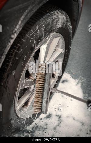 Details of cleaning car parts in self service car wash box Stock Photo